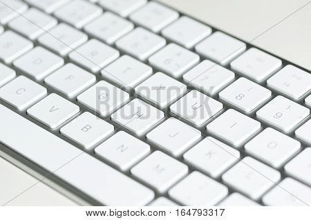 element computer taken in the foreground with white backgrounds