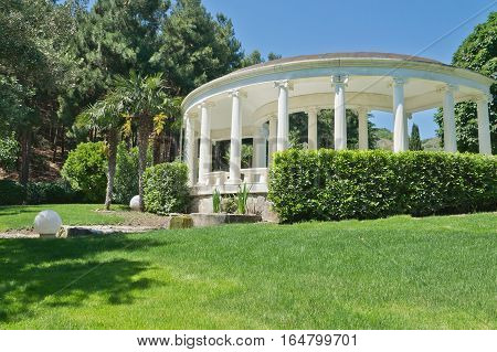 PARTENIT CRIMEA RUSSIA - JUNE 07.2015 Gazebo in the olive grove Park 