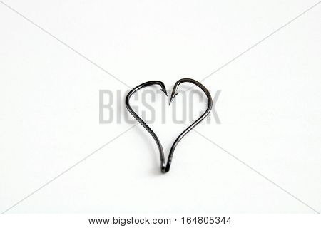 The Metal Hooks Placed Heart Symbols On White Background