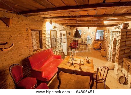 TSINANDALI, GEORGIA - OCT 2, 2016: Interior of house-museum of aristocratic poet Alexander Chavchavadze, 1786 - 1846, with fireplace on October 2, 2016. In this homestead was built first Georgian wine factory