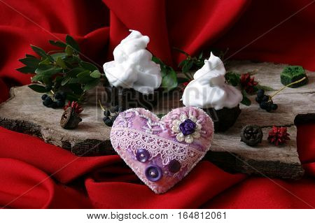 Two cake with whipped cream and pink heart