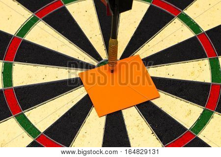 Darts With Dart Which Was Pinned A Sheet Of Paper For Labels