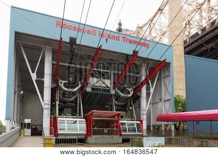 NEW YORK - MAY 3 2016: cable car house of the roosevelt island tramway. Each cabin accommodates a capacity of 125 people makes approximately 115 trips per day and about 100 on weekends.