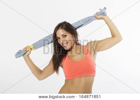 Studio portrait of fitness instructor with neutral background