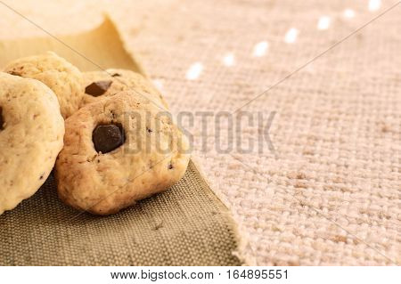 Homemade cookies with chocolate are a hundful of the window.