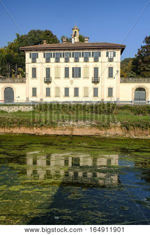 Cassinetta di Lugagnano (Milan Lombardy Italy): facade of the historic Villa Visconti Maineri along the canal known as Naviglio Grande of Turbigo
