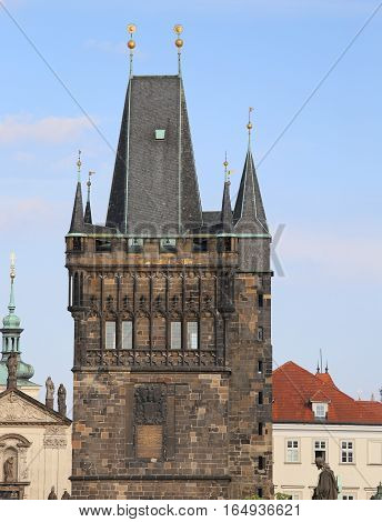 Prague With The Medieval Tower Of The Charles Bridge Over The Vl