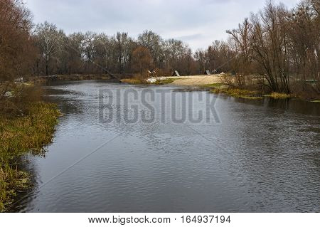 Landscape at gloomy autumnal day a on a Psel river Ukraine