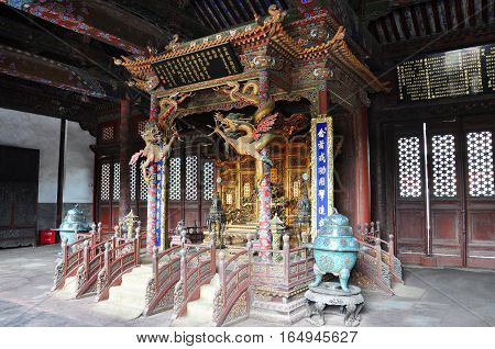 Shenyang Imperial Palace (Mukden Palace) Throne of Chongzheng Hall, Shenyang, Liaoning Province, China. Shenyang Imperial Palace is UNESCO world heritage site built in 400 years ago.