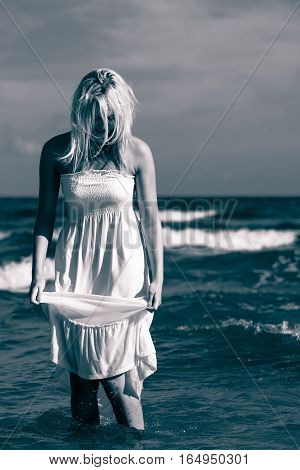 Young Woman Chilling Out On The Beach.