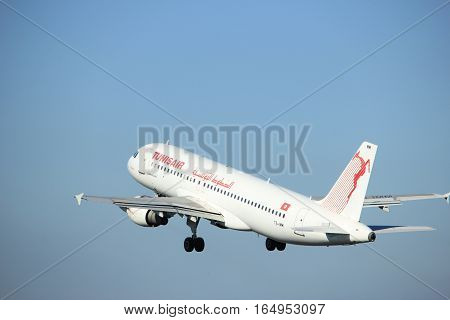 Amsterdam the Netherlands - August 18th 2016: TS-IMM Tunisair Airbus A320-211 taking off from Polderbaan Runway Amsterdam Airport Schiphol
