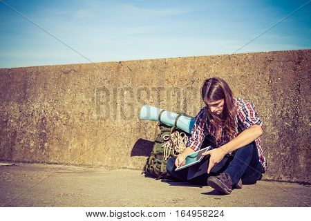 Man Tourist Backpacker Sitting With Tablet Outdoor
