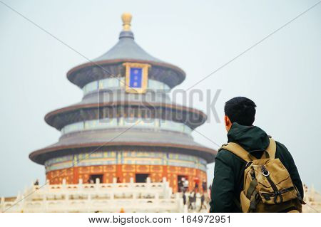 Young Traveler Standing In Front Of Temple Of Heaven - In Beijing, China. Asia Travel