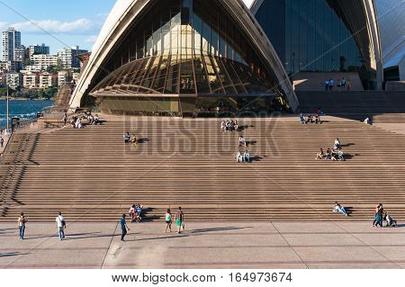 People Relaxing On Stairs Of Sydney Opera House
