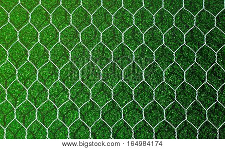 Earth retention wall with artificial grass, closeup view