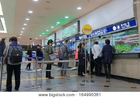 SEOUL SOUTH KOREA - OCTOBER 23, 2016: Unidentified people buy train ticket at KTX ticket office.