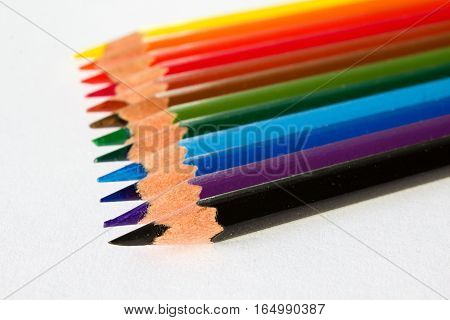 Colours spectrum pens on the white wallpaper. Pen for draw. Tool for children's painter.