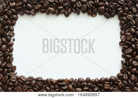 The frame of the roasted coffee on a white background.