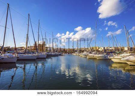 Msida Malta - Yacht marina with blue sky and nice clouds on a summer day