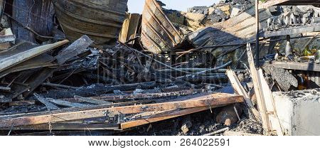 Damaged Industry Supermarket Metallic Facade After Arson Fire With Burnt Debris After Intense Burnin