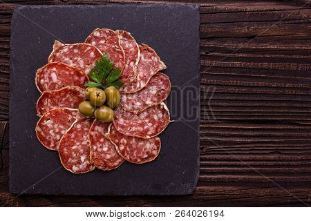 Saucisson Sec Delicious French Salami On A Wooden Background