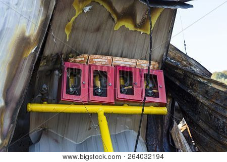 Damaged Industry Supermarket Metallic Facade After Arson Fire With Burnt Debris After Intense Burnin