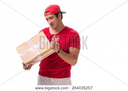 Handsome contractor holding fragile box isolated on white 