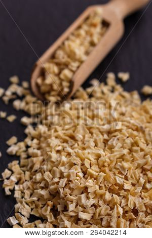 Fragrant Dried Parsnip On A Dark Stone Background