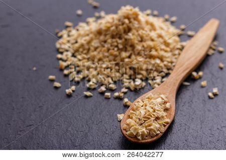 Fragrant Dried Parsnip On A Dark Stone Background