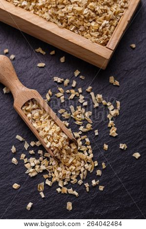 Fragrant Dried Parsnip On A Dark Stone Background