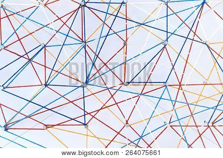 Abstract Colored Threads Are Stretched On Pins On White Background Depicting Ties And Knots. Logisti