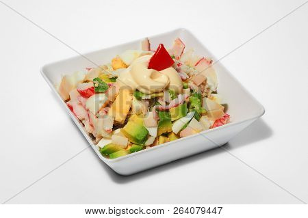 Salad With Calamar, Avocado, Crab Sticks, Eggs In White Cup