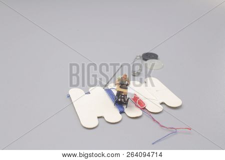 A Mini Of Dress Maker Woman Working