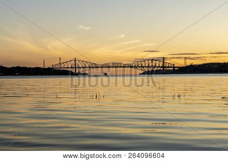 Quebec City Bridge In Canada On The Sunset