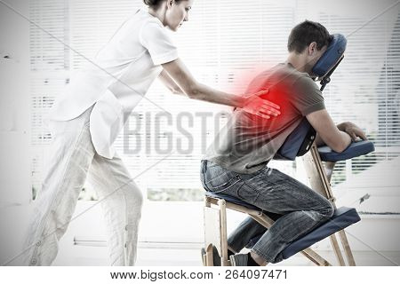 Highlighted pain against therapist massaging patient back