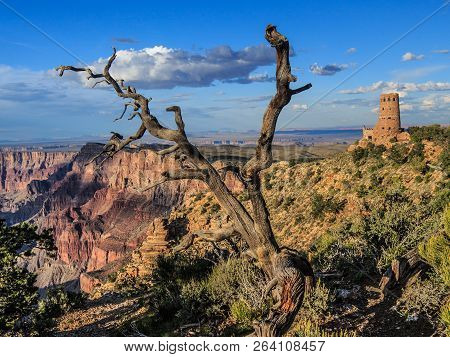 Sunrise At Mather Point, Grand Canyon National Park, Arizona. Photo Shows A Group Of Tourists Watchi