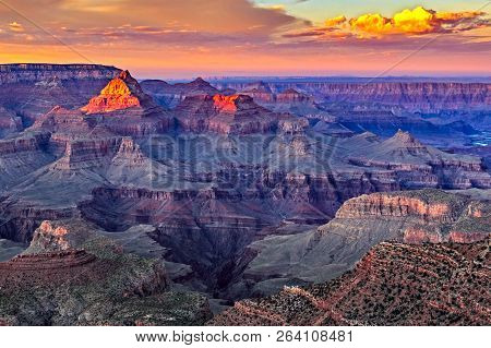Sunrise At Mather Point, Grand Canyon National Park, Arizona. Photo Shows A Group Of Tourists Watchi
