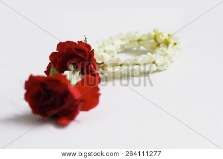 Soft Focus Thai Traditional Craft Flower Garland Isolated On White Background.