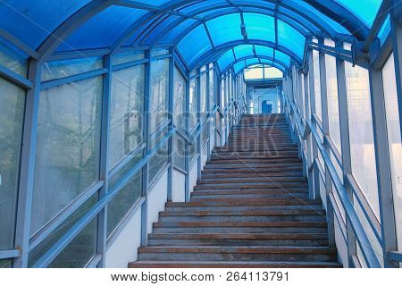Stairs Of Elevated Pedestrian Crossing From The Inside. Safe Passage Across The Road.