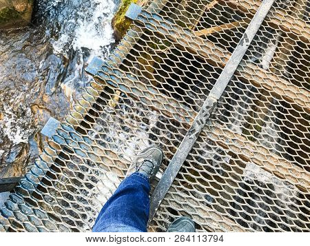 Travel To North Caucasus Region Region - Step On Lattice Bridge Over Mountain River Alikonovka Near 