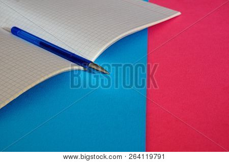 Time For Business And Study. The Pen Lies On The Notebook For Mathematics.