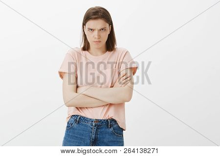 I Am Angry Do Not Talk To Me. Portrait Of Outraged Offended Cute Female Student, Holding Hands Cross