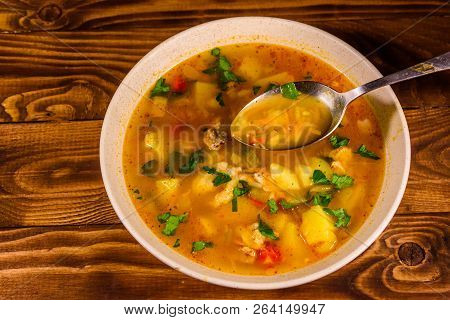 Georgian Traditional Food Soup Kharcho On Rustic Wooden Table. Top View
