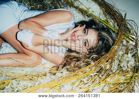 Tender Woman In Feathers. Relax And Comfort. Dreamy Angel Woman Like In A Dream