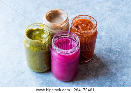 Jar Of Beet Dip Sauce, Almond Butter Or Tahini Pistachio Urbech And Salsa (tomato Paste) Sauce