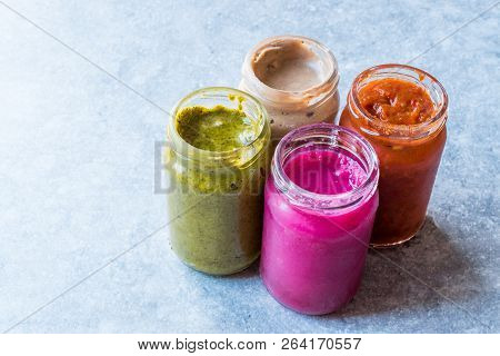 Jar Of Beet Dip Sauce, Almond Butter Or Tahini Pistachio Urbech And Salsa (tomato Paste) Sauce