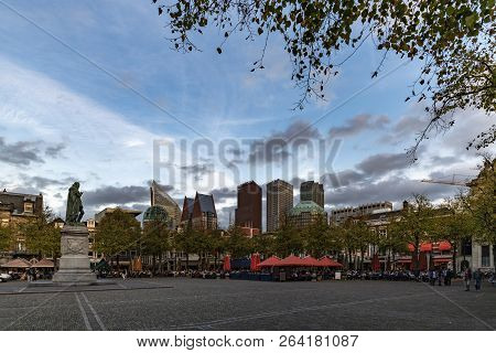 Central Place, Spui In Dutch, Crowded With People Getting Diner And Drink During The Sunset And Warm