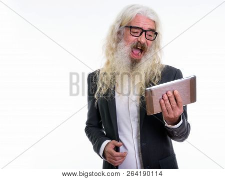 Studio Shot Of Happy Senior Bearded Businessman Smiling And Laug