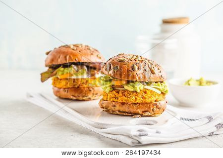 Vegan Sweet Potato (or Pumpkin) Burgers On White Background. Vegetable Burgers, Avocado, Vegetables 