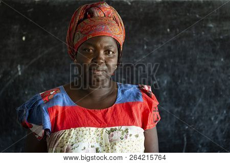 Orango Island, Guinea-bissau - February 3, 2018: Portrait Of A School Teacher Inside The Classroom I